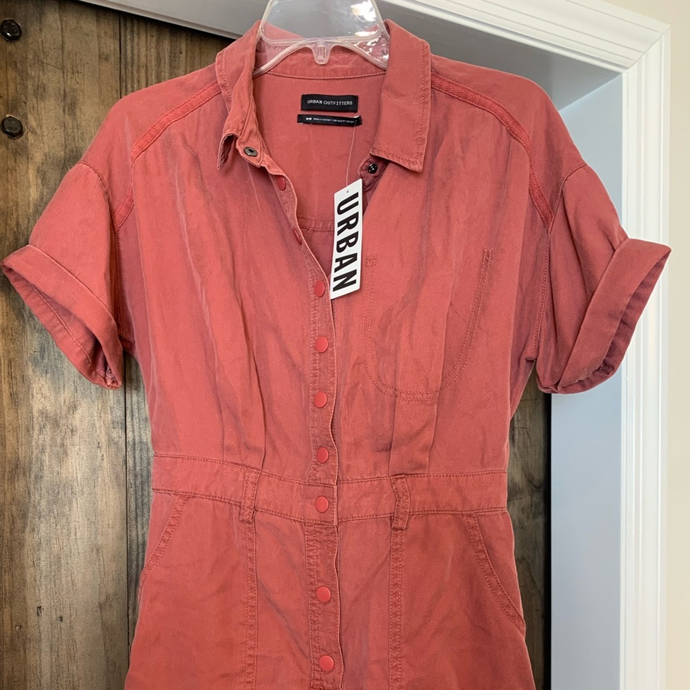 The cutest urban outfitters relaxed denim romper in rust color!